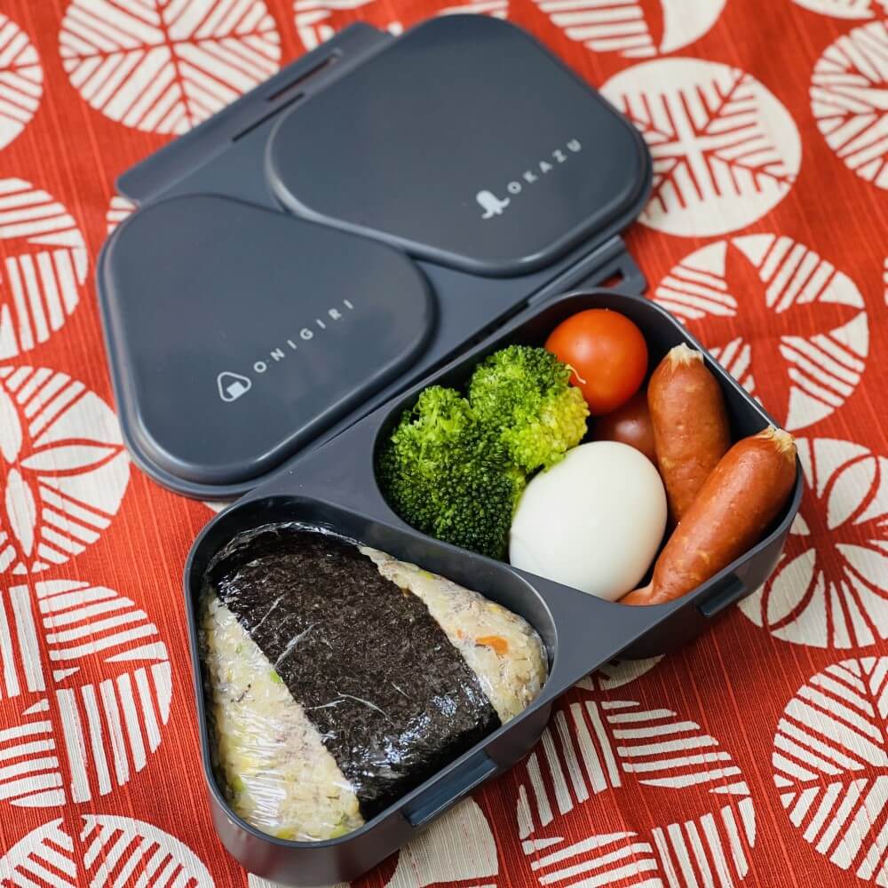 bento prepared in black onigiri maker lunch case