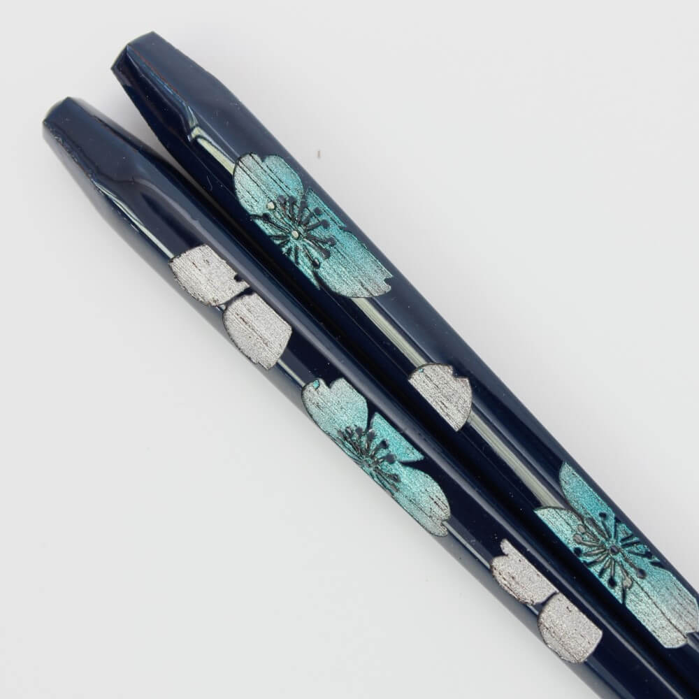 close up of blue ousai chopsticks showing sakura patterns