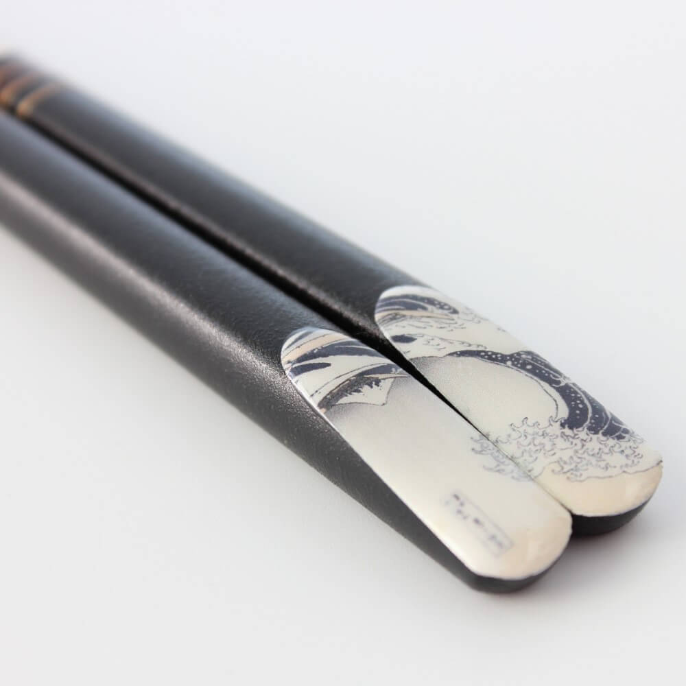 close up great wave print chopsticks handles