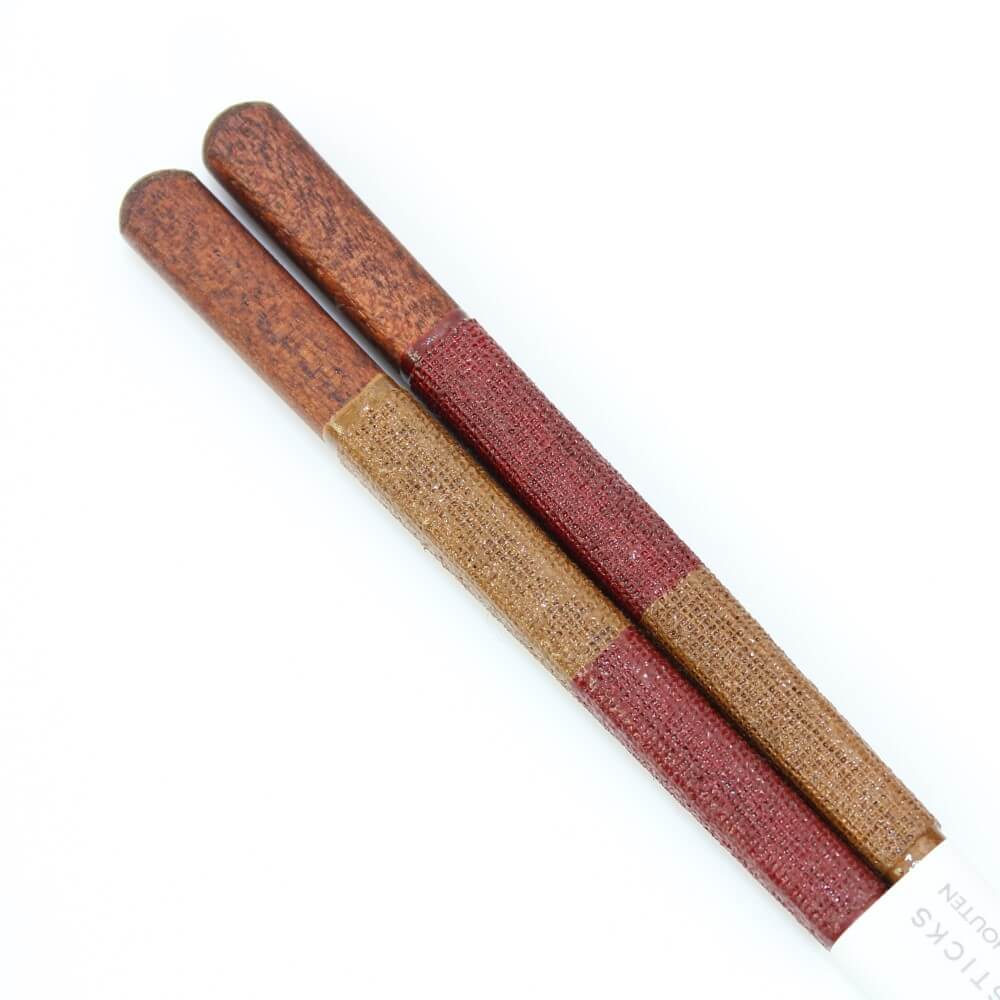 close up handles ichimatsu brown red chopsticks