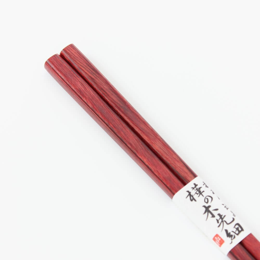 close up handles showing grains birch red chopsticks