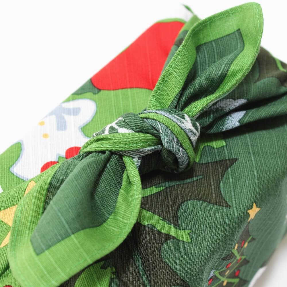 close up knot wrapped christmas green furoshiki 