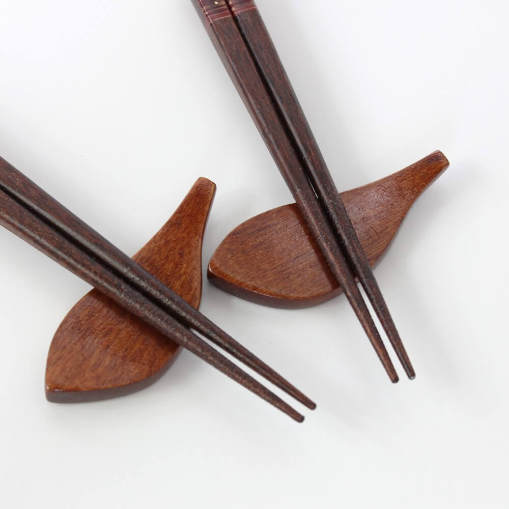 close up sakura gold chopsticks tips