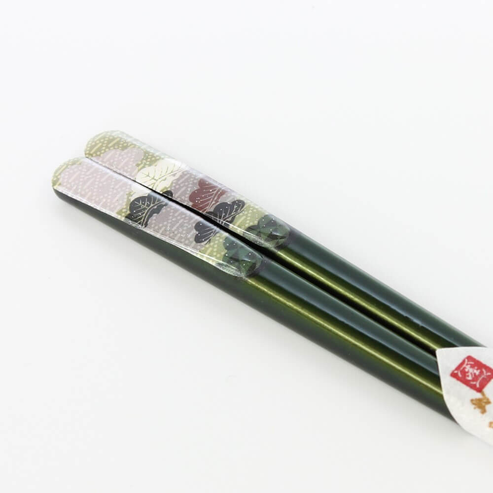 close upshowing fukuju green chopsticks handles