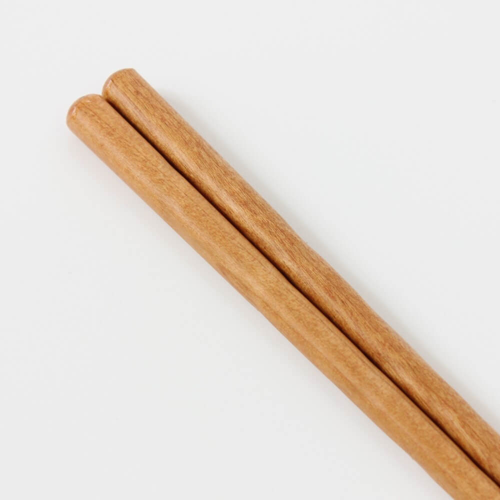 close up showing grain of sakura cherry chopsticks