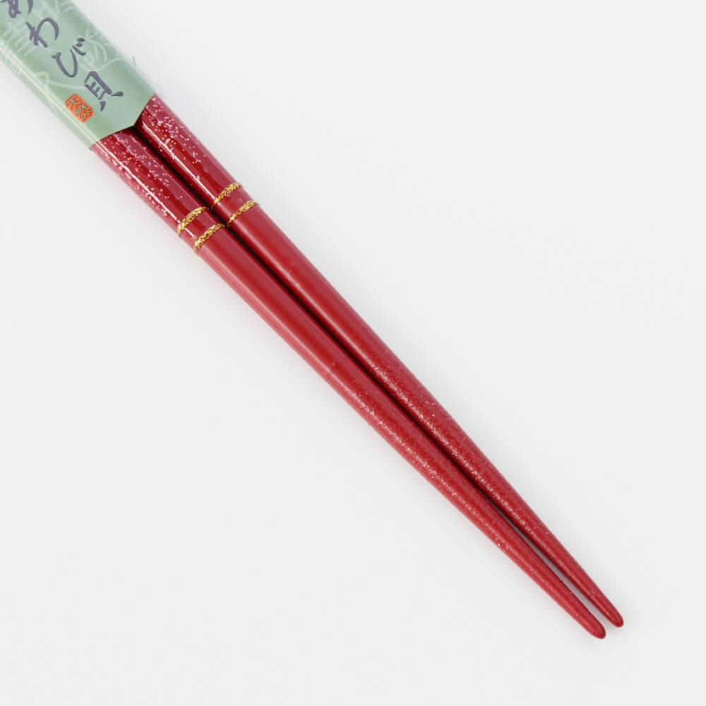 close up tips red sakura ame chopsticks