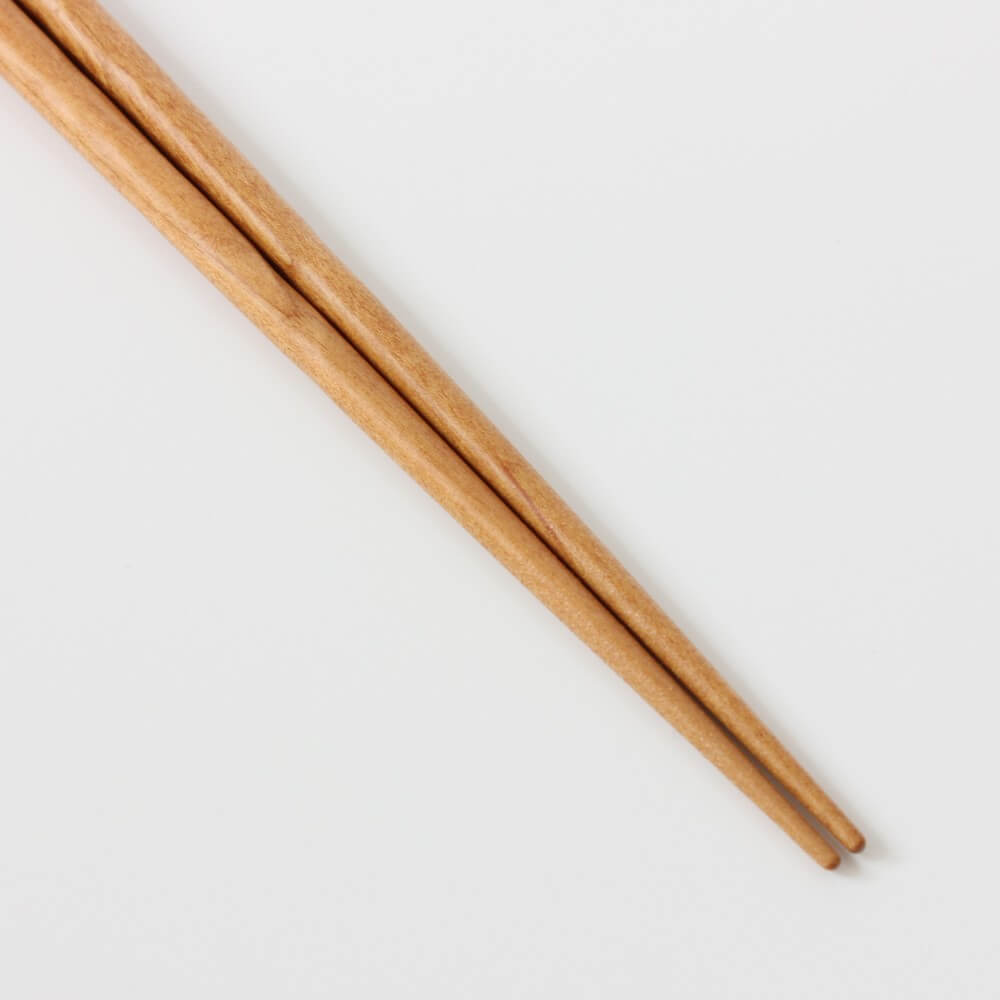 close up tips sakura cherry tree chopsticks