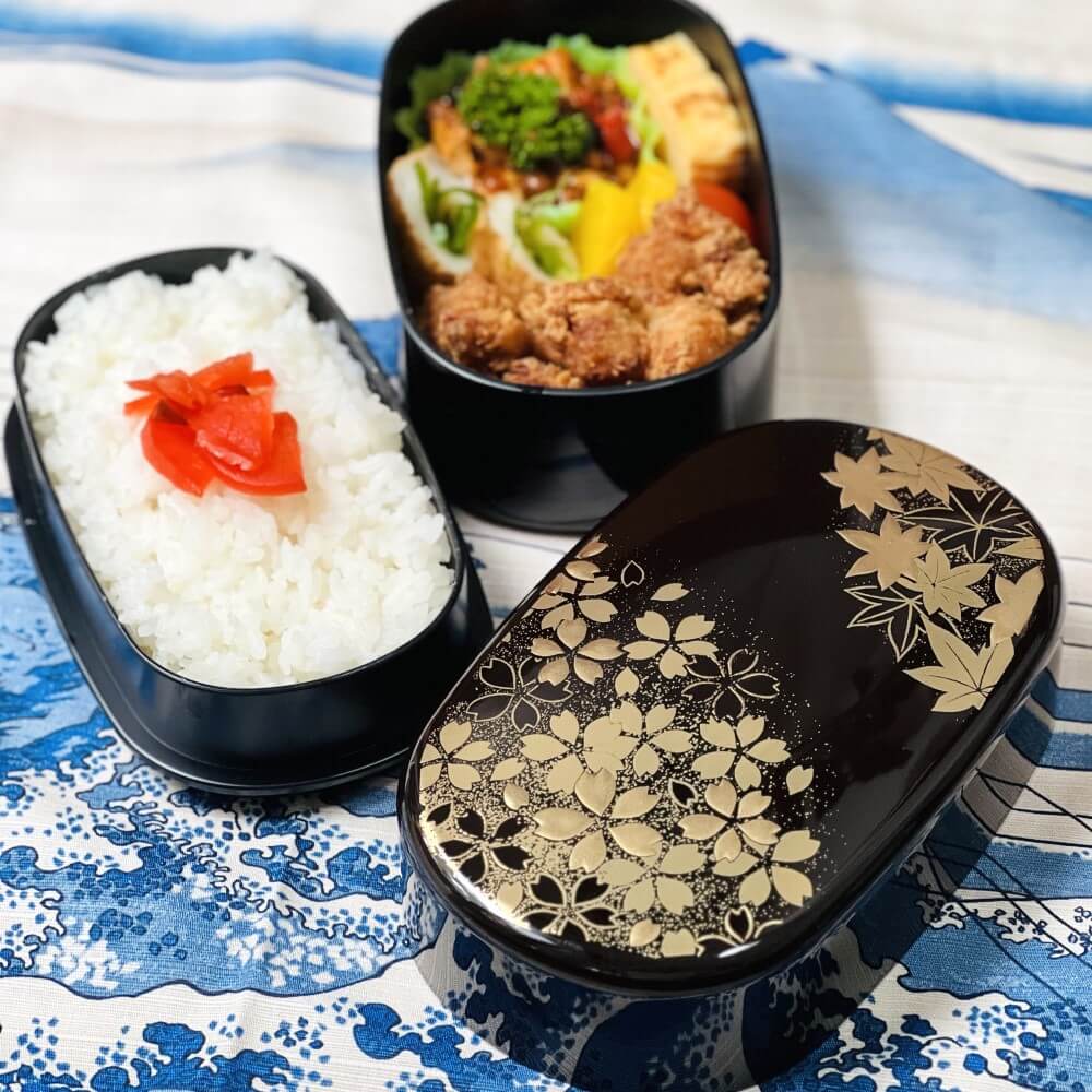 hanamaru brown oval bento box with food