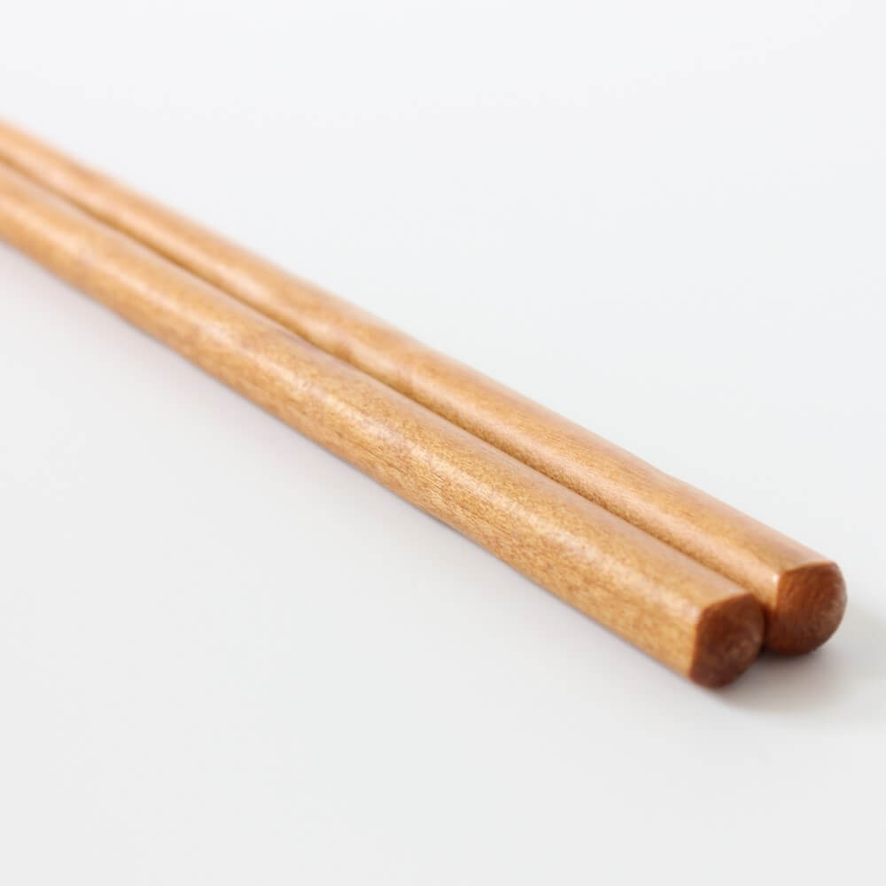 low angle close up showing texture sakura cherry chopsticks