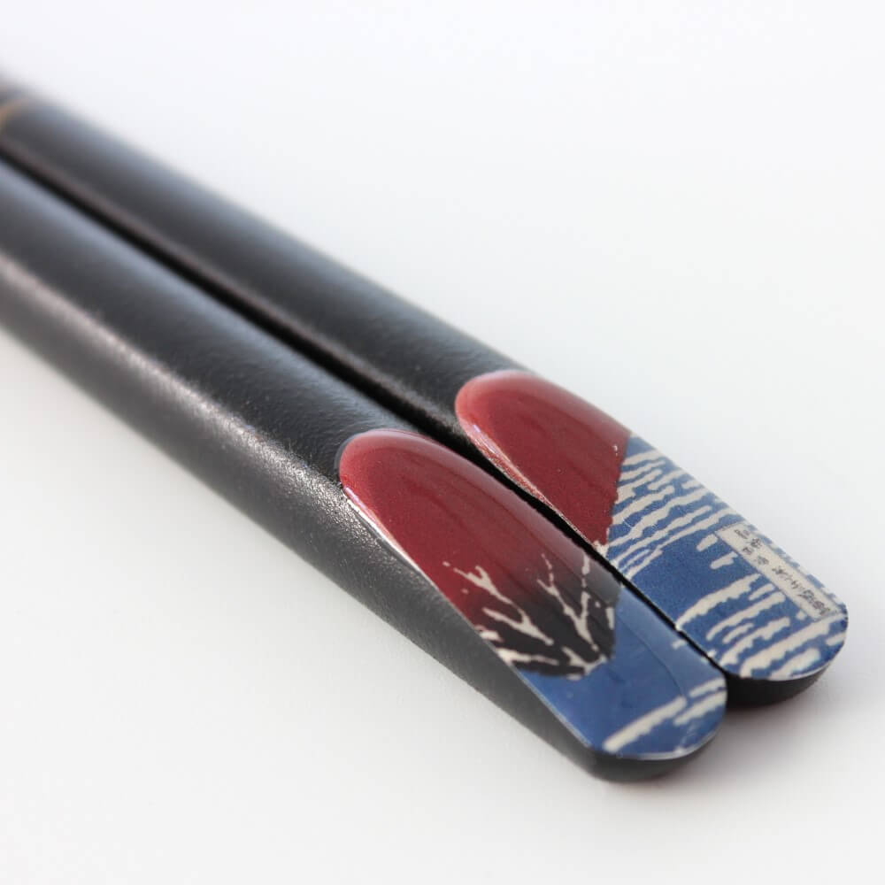 low angle photo handle tips red fuji chopsticks