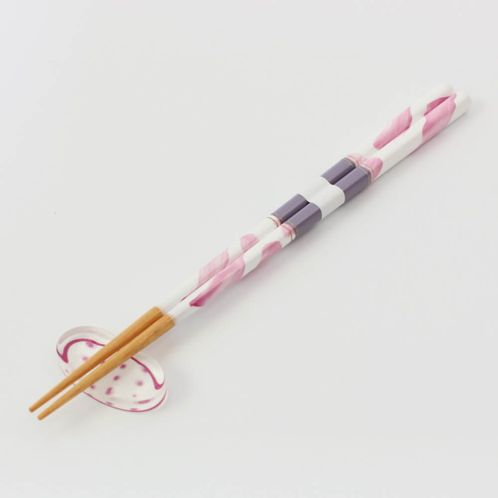 pink dolce fiore chopsticks on rest