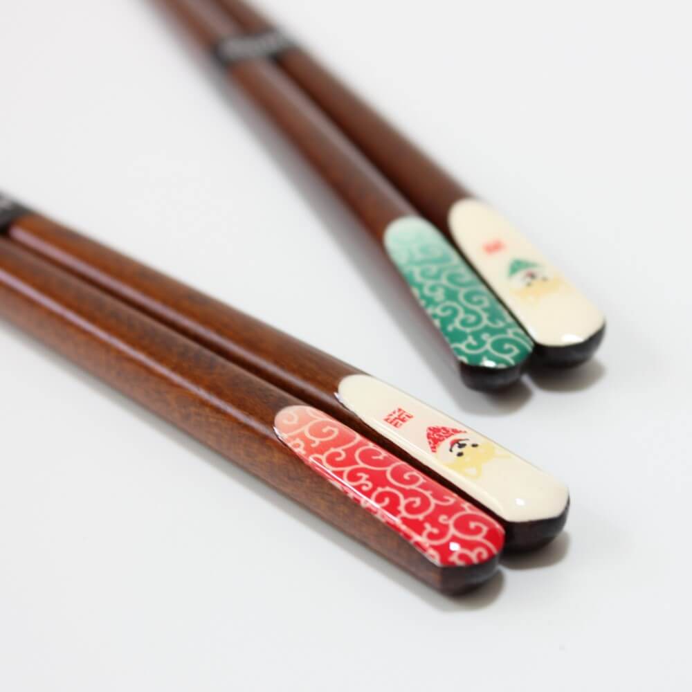 red shiba inu karakusa chopsticks in foreground